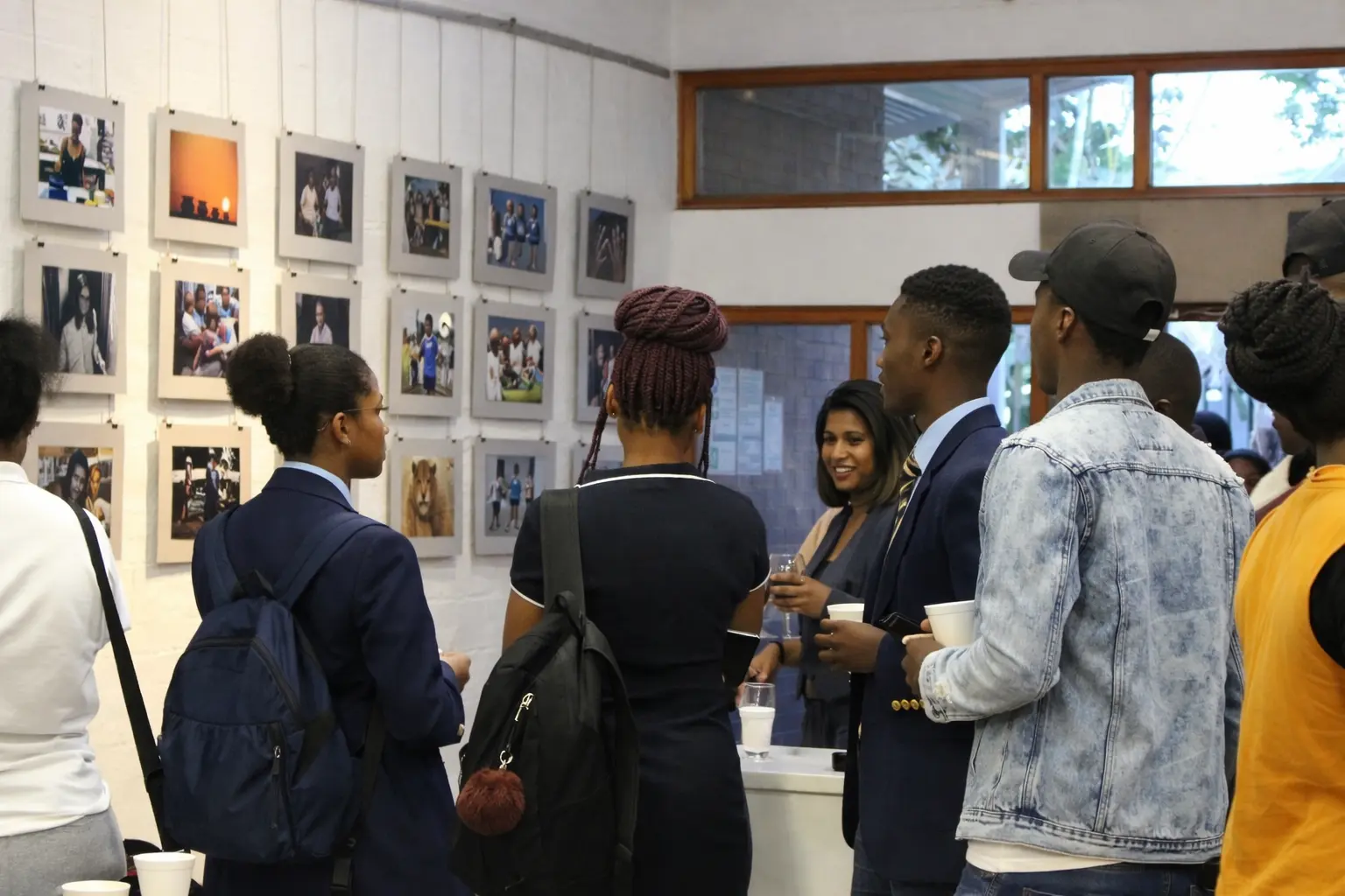 Students and guests viewing an exhibition